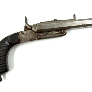 European double-barrel pinfire pistol with carved wooden grip