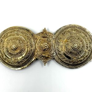 Traditional gilded belt buckle with folkloric design