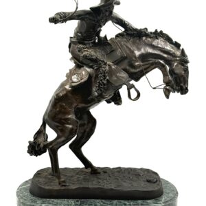 Bronze sculpture Frederic Remington depicting cowboy taming wild horse