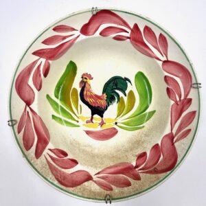 ceramic plate with rooster motif.
